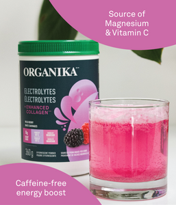 Electrolytes + Enhanced Collagen pink drink in a glass