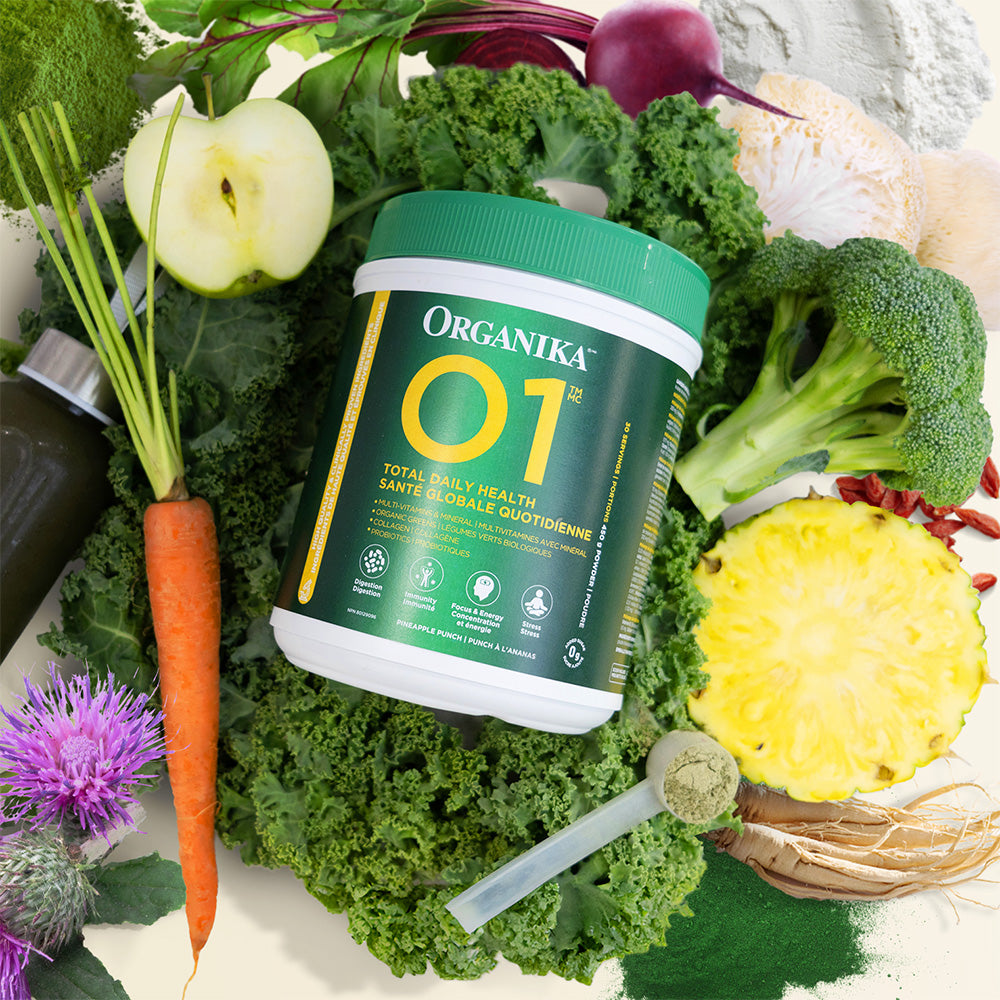 Organika's O1 Total Daily Health surrounded by quality ingredients like fruits and vegetables